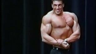 Vintage Bodybuilder Posing on Stage