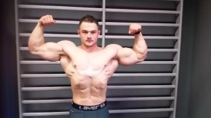 Young European muscle stub flexing