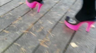 Walking in candy pink mules
