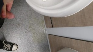 Public toilet floor peeing