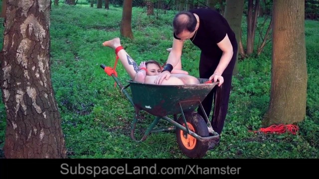 Young slave get tied up and fucked in the garden